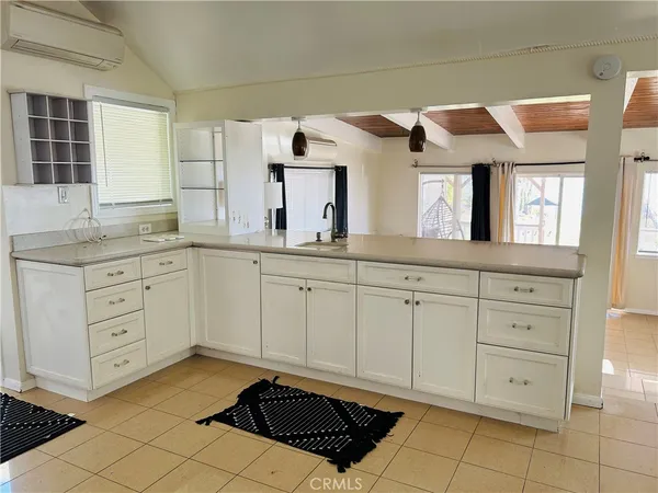 a bathroom with a sink a vanity and mirror