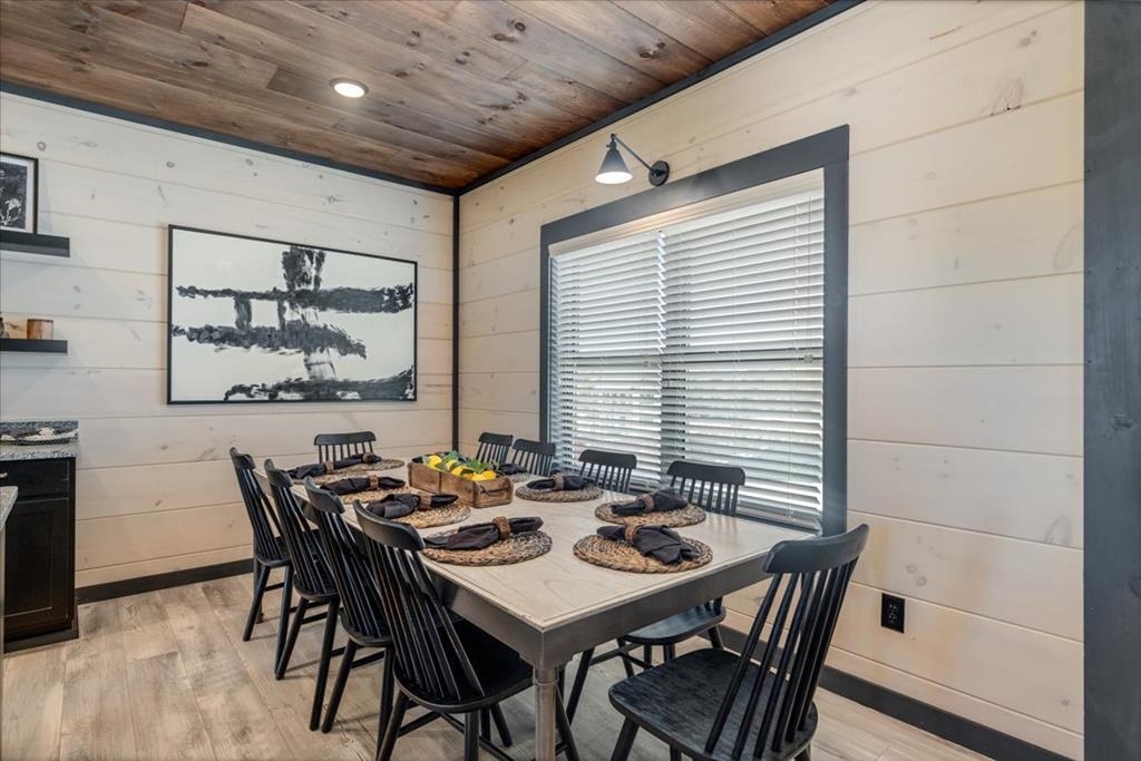 288 Rambling Creek Way, Unit LOT 79R Sevierville, TN 37862 - Photo 29 of 40 a view of a dining room with furniture and window