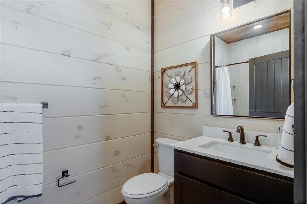 288 Rambling Creek Way, Unit LOT 79R Sevierville, TN 37862 - Photo 35 of 40 a bathroom with a granite countertop sink toilet and shower