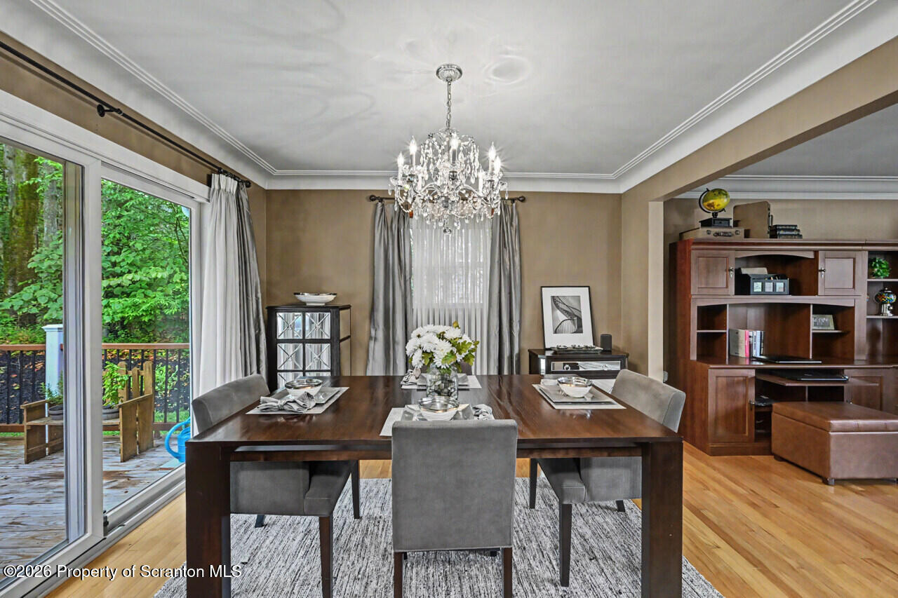 121 T Rt 351 Moscow, PA 18444 - Photo 22 of 79 a view of a dining room with furniture window and outside view