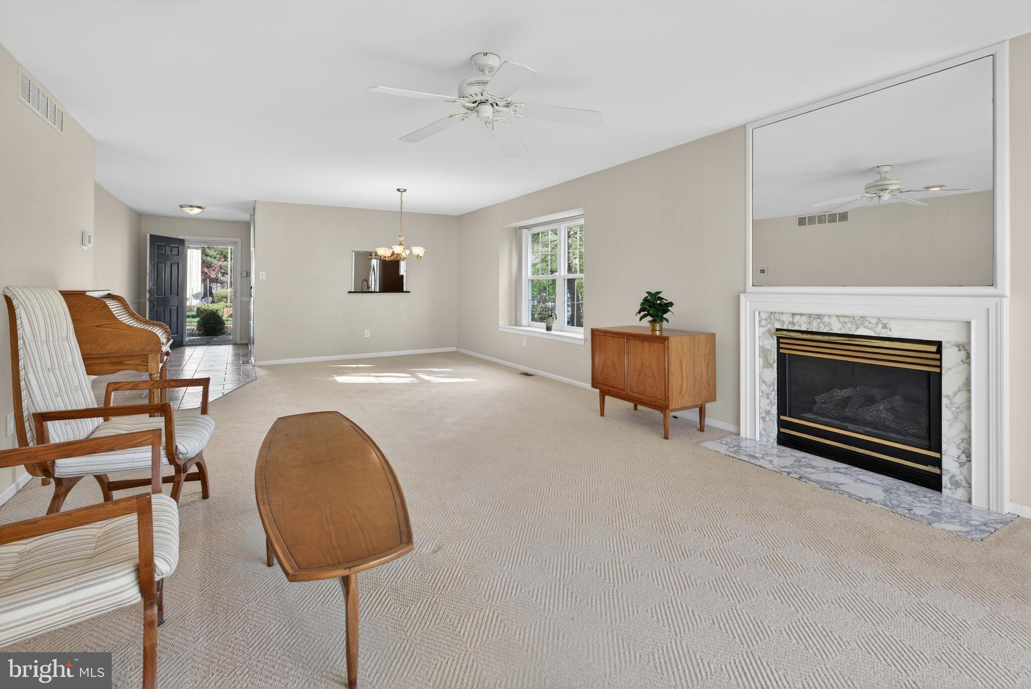 7401A Normandy Drive Mount Laurel, NJ 08054 - Photo 11 of 35 a living room with furniture and a fireplace