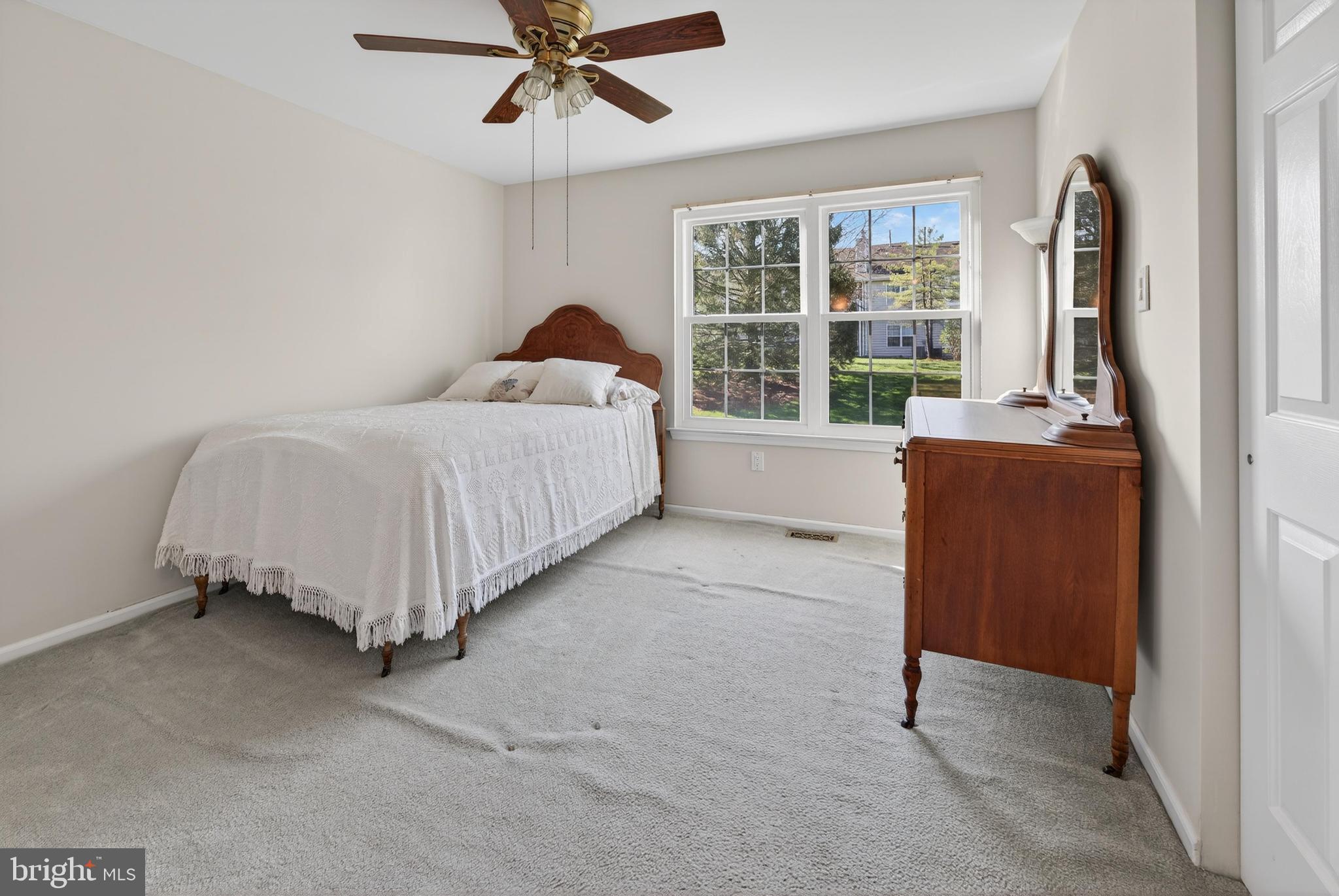7401A Normandy Drive Mount Laurel, NJ 08054 - Photo 17 of 35 a bed room with a bed and a window