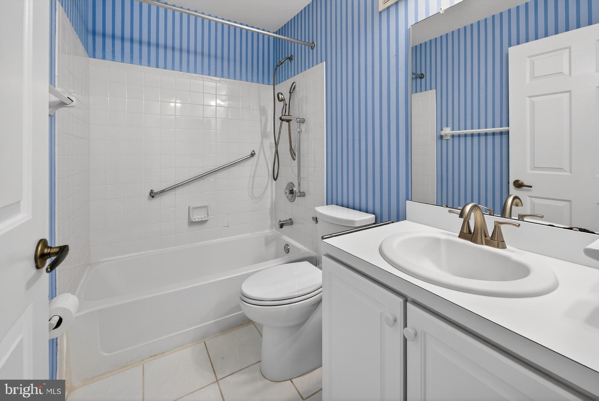 7401A Normandy Drive Mount Laurel, NJ 08054 - Photo 18 of 35 a bathroom with a sink a toilet and shower