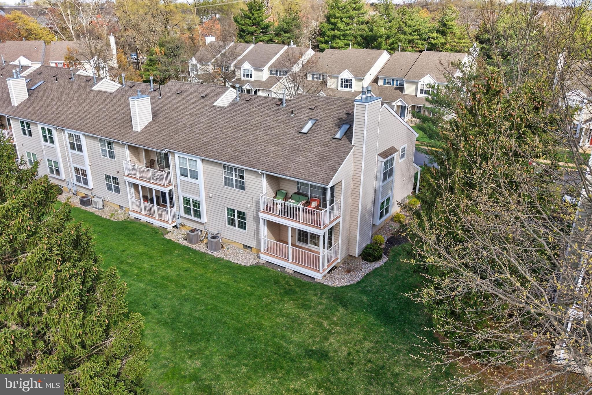 7401A Normandy Drive Mount Laurel, NJ 08054 - Photo 26 of 35 an aerial view of residential house with yard and trees
