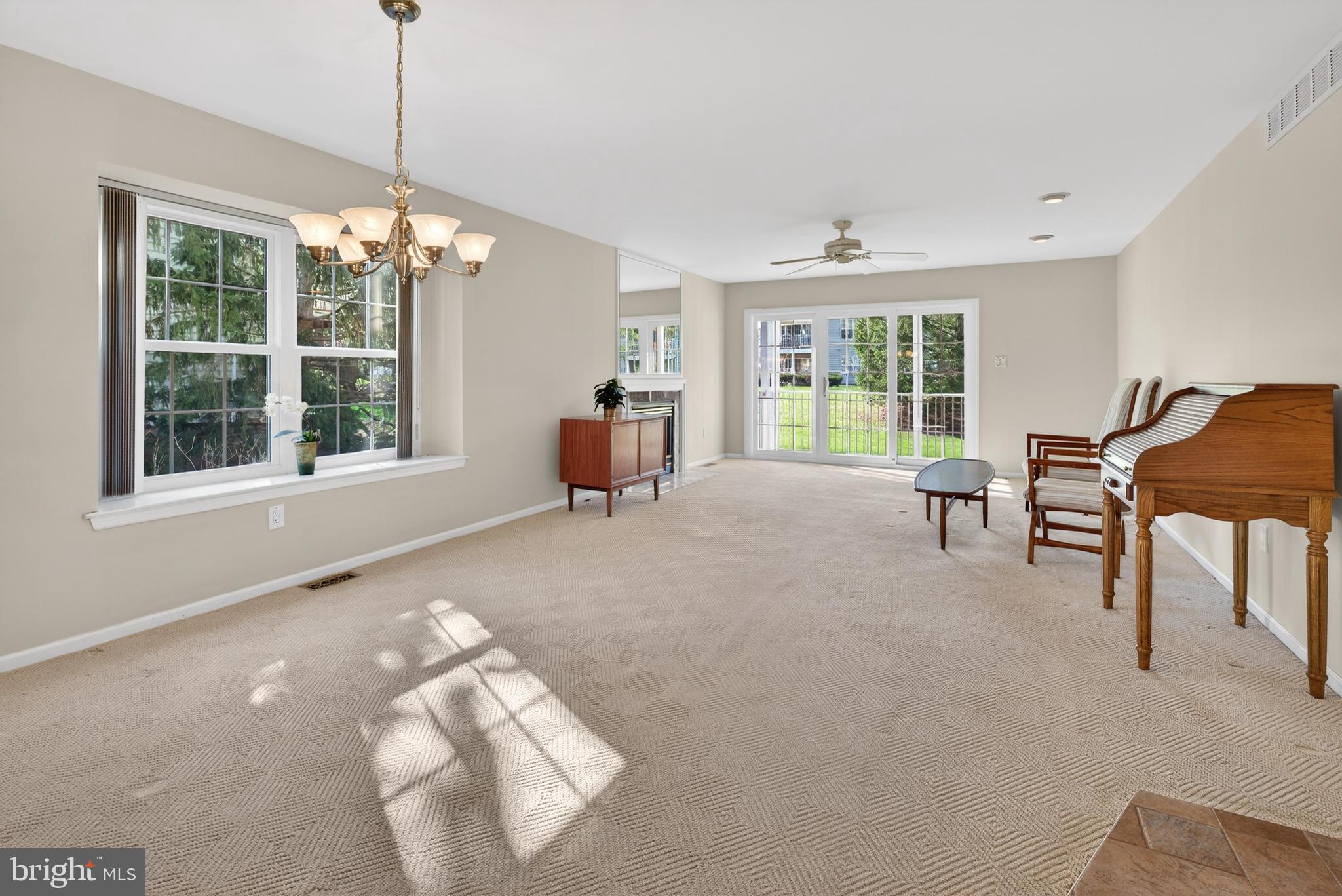 7401A Normandy Drive Mount Laurel, NJ 08054 - Photo 8 of 35 a view of a livingroom with furniture window and outside view