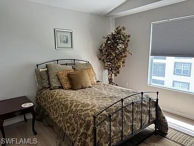 7905 Preserve Circle, Unit 138 Naples, FL 34119 - Photo 14 of 27 a bedroom with a bed and a window
