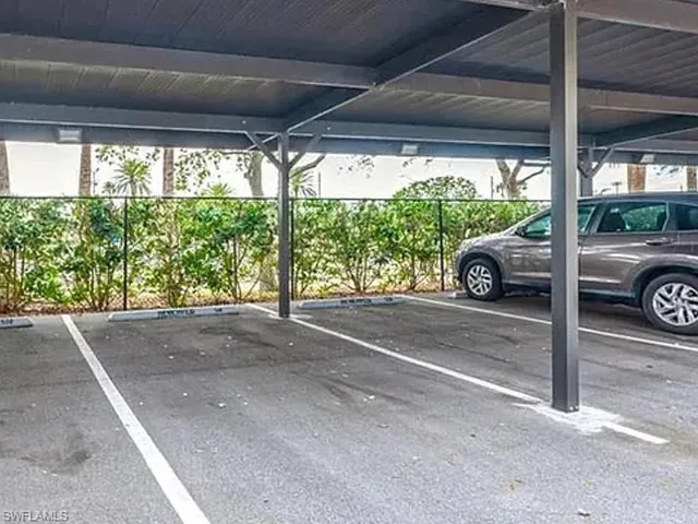 a car parked in front of a house