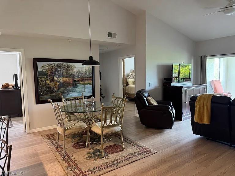 7905 Preserve Circle, Unit 138 Naples, FL 34119 - Photo 7 of 27 a living room with furniture a window and a flat screen tv