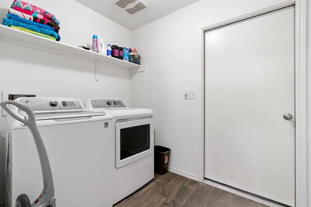 a utility room with dryer and washer