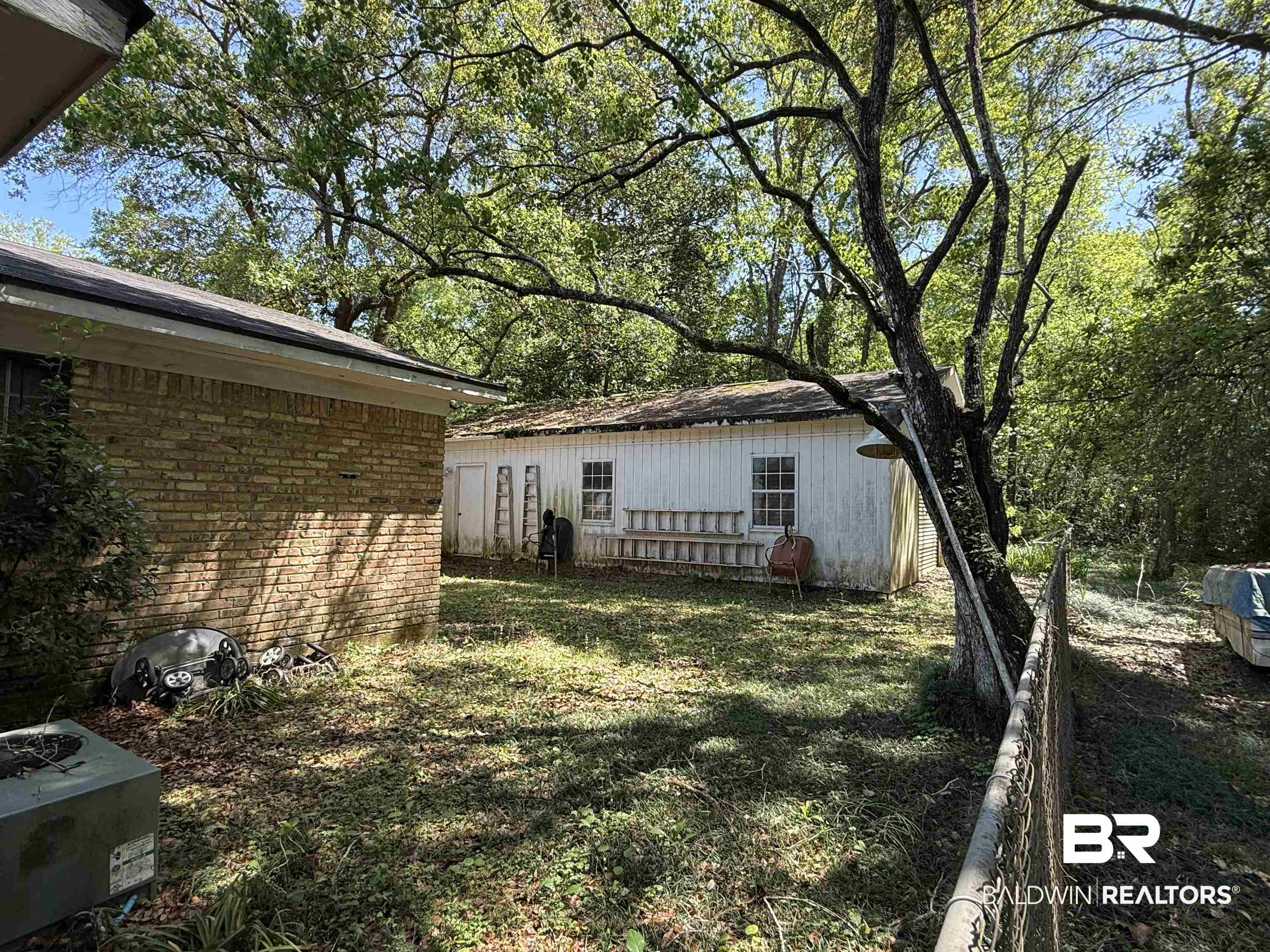 607 West Lee Street Mobile, AL 36611 - Photo 2 of 11 View of yard with an outbuilding