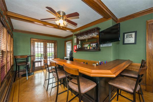 40 Hutchinson Road Arlington, MA 02474 - Photo 13 of 23 a view of a dining room with furniture window and wooden floor