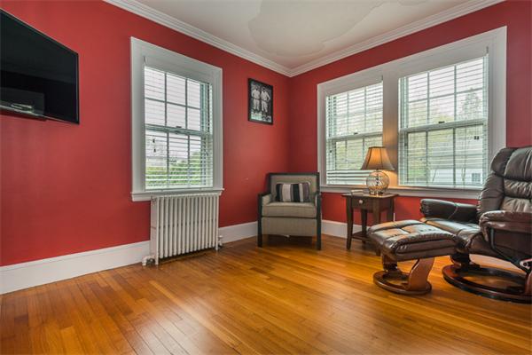 40 Hutchinson Road Arlington, MA 02474 - Photo 19 of 23 a bedroom with furniture and a window