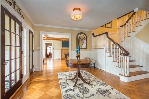 40 Hutchinson Road Arlington, MA 02474 - Photo 3 of 23 a living room with fireplace furniture and a wooden floor