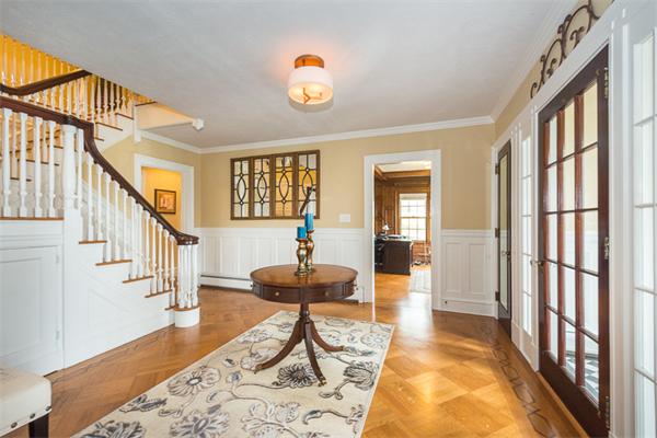40 Hutchinson Road Arlington, MA 02474 - Photo 4 of 23 a living room with furniture and a large window