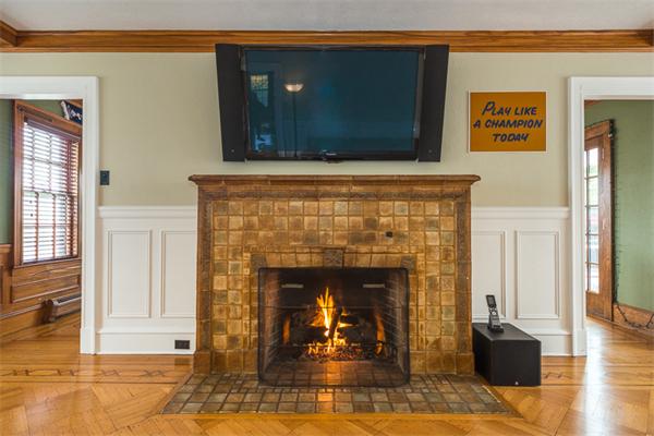 40 Hutchinson Road Arlington, MA 02474 - Photo 8 of 23 a living room with furniture and a fireplace
