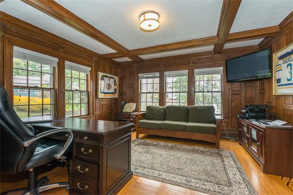 40 Hutchinson Road Arlington, MA 02474 - Photo 9 of 23 a living room with furniture and a flat screen tv
