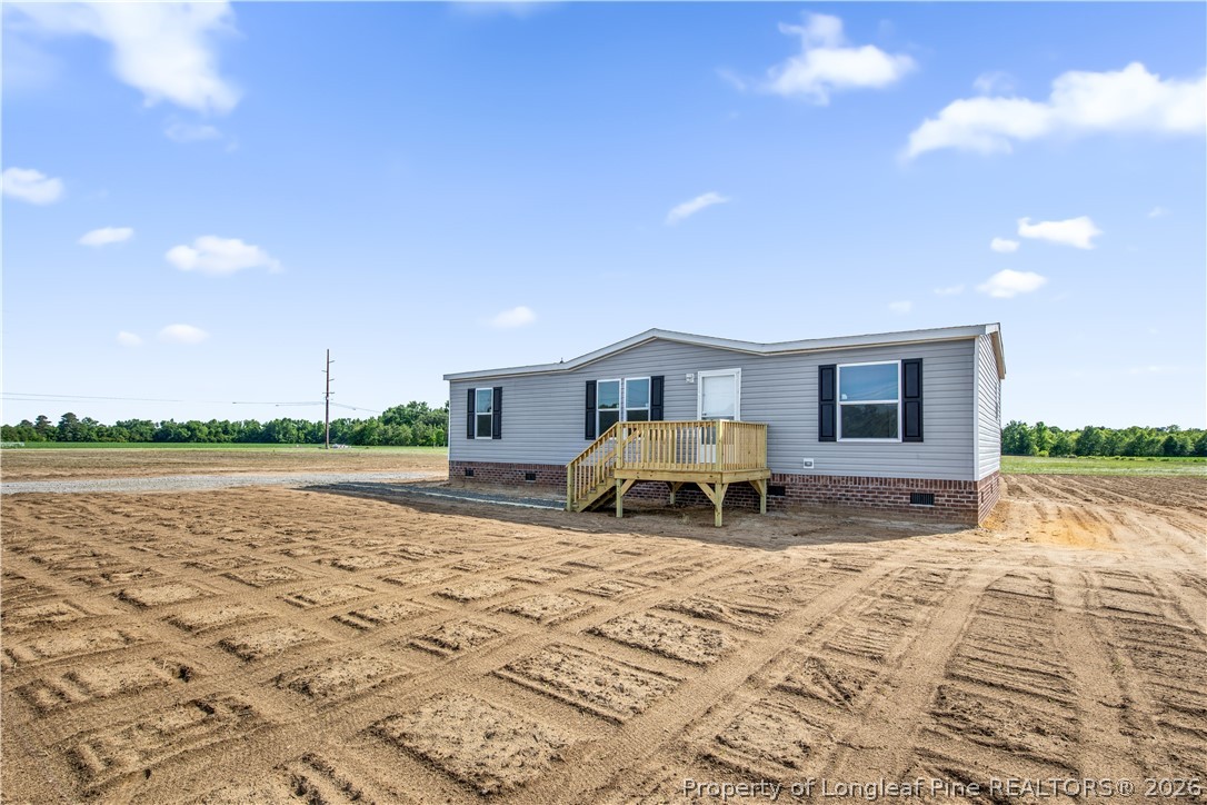 6309 Deep Branch Road Pembroke, NC 28372 - Photo 2 of 32 a house view with a outdoor space