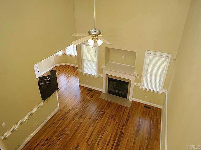 2800 Candlehurst Lane Raleigh, NC 27616 - Photo 2 of 9 a view of a livingroom with wooden floor