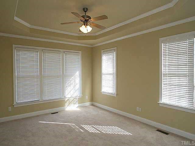 2800 Candlehurst Lane Raleigh, NC 27616 - Photo 5 of 9 a view of an empty room with a window