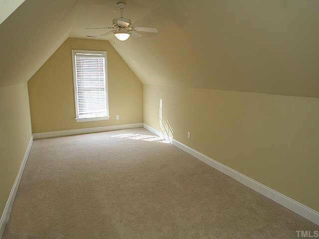 2800 Candlehurst Lane Raleigh, NC 27616 - Photo 9 of 9 an empty room with windows and entrance