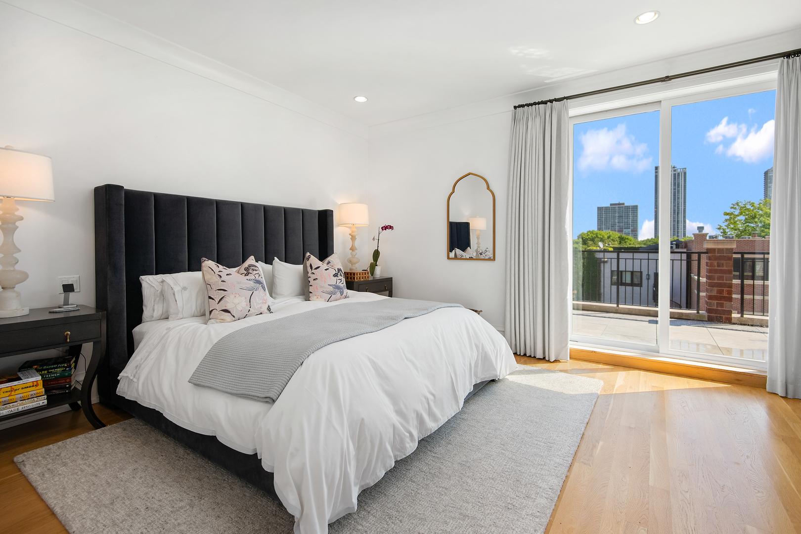 1733 North Mohawk Street, Unit 3N Chicago, IL 60614 - Photo 12 of 29 a bed room with a bed and a large window