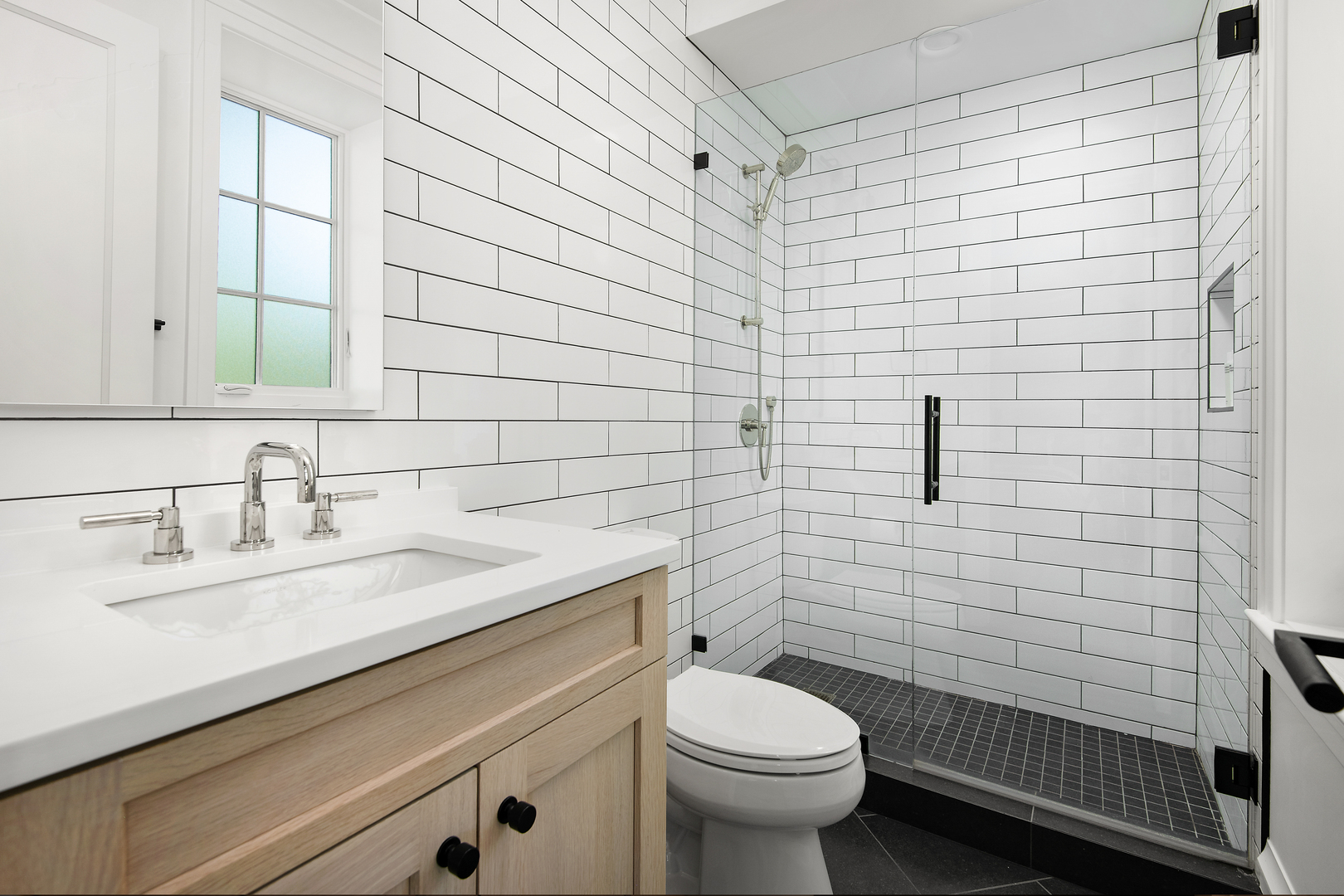 1733 North Mohawk Street, Unit 3N Chicago, IL 60614 - Photo 18 of 29 a bathroom with a sink a toilet and shower