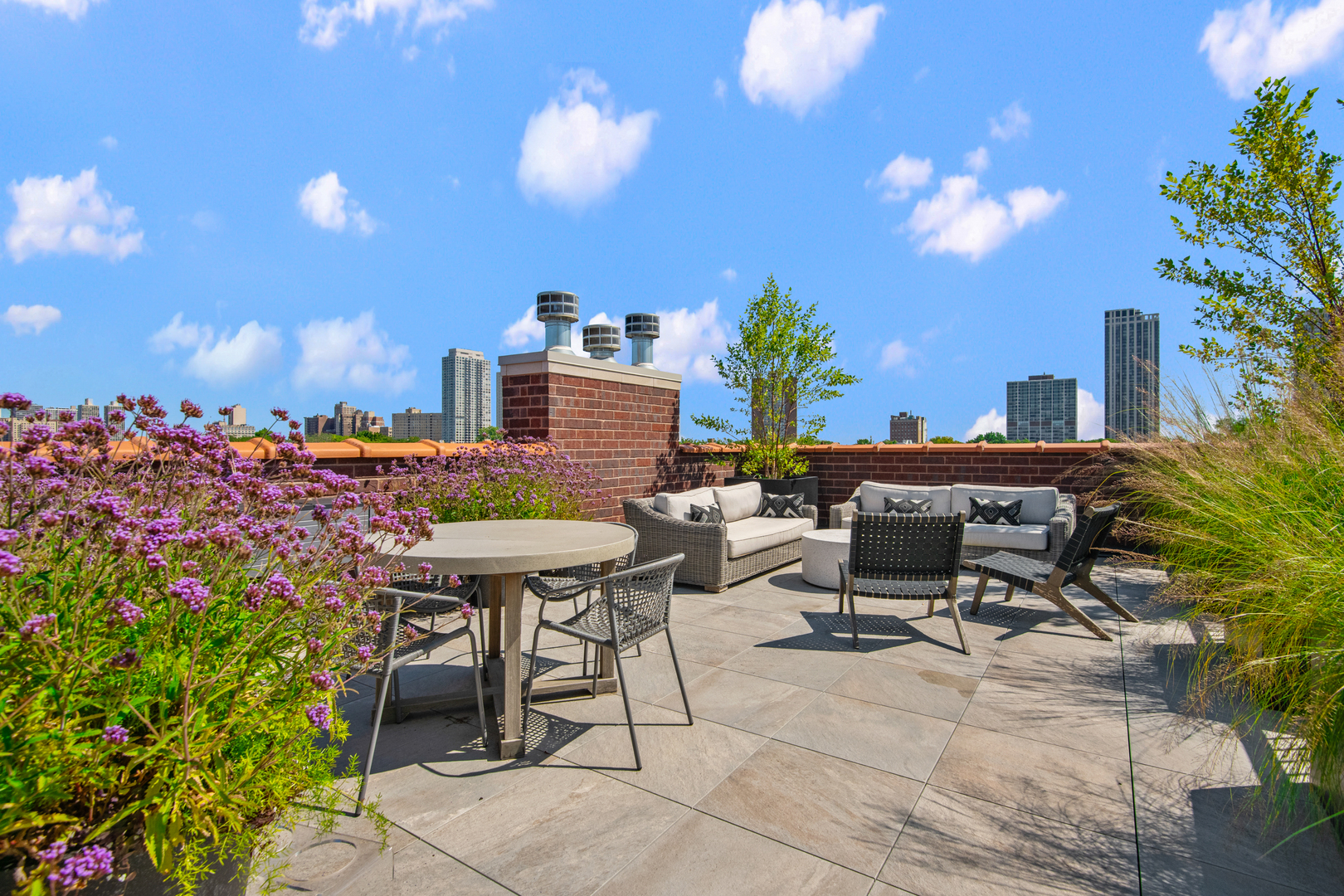 1733 North Mohawk Street, Unit 3N Chicago, IL 60614 - Photo 24 of 29 a view of a patio with table and chairs and potted plants