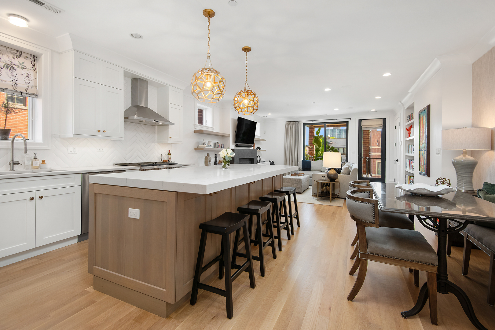 1733 North Mohawk Street, Unit 3N Chicago, IL 60614 - Photo 4 of 29 a kitchen with a table chairs sink and cabinets