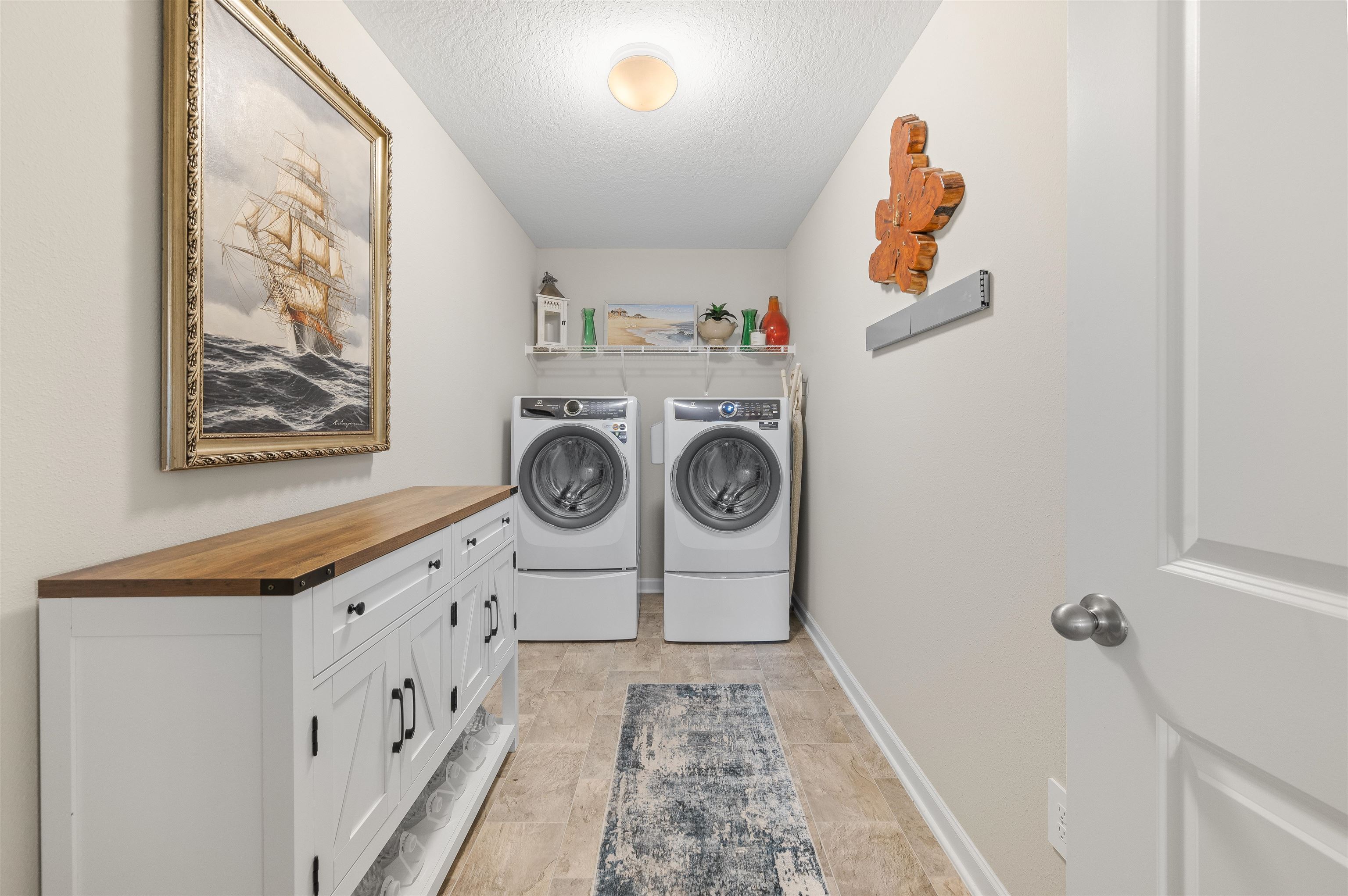 71 Barbosa Trail St. Augustine, FL 32095 - Photo 15 of 51 a utility room with dryer and washer