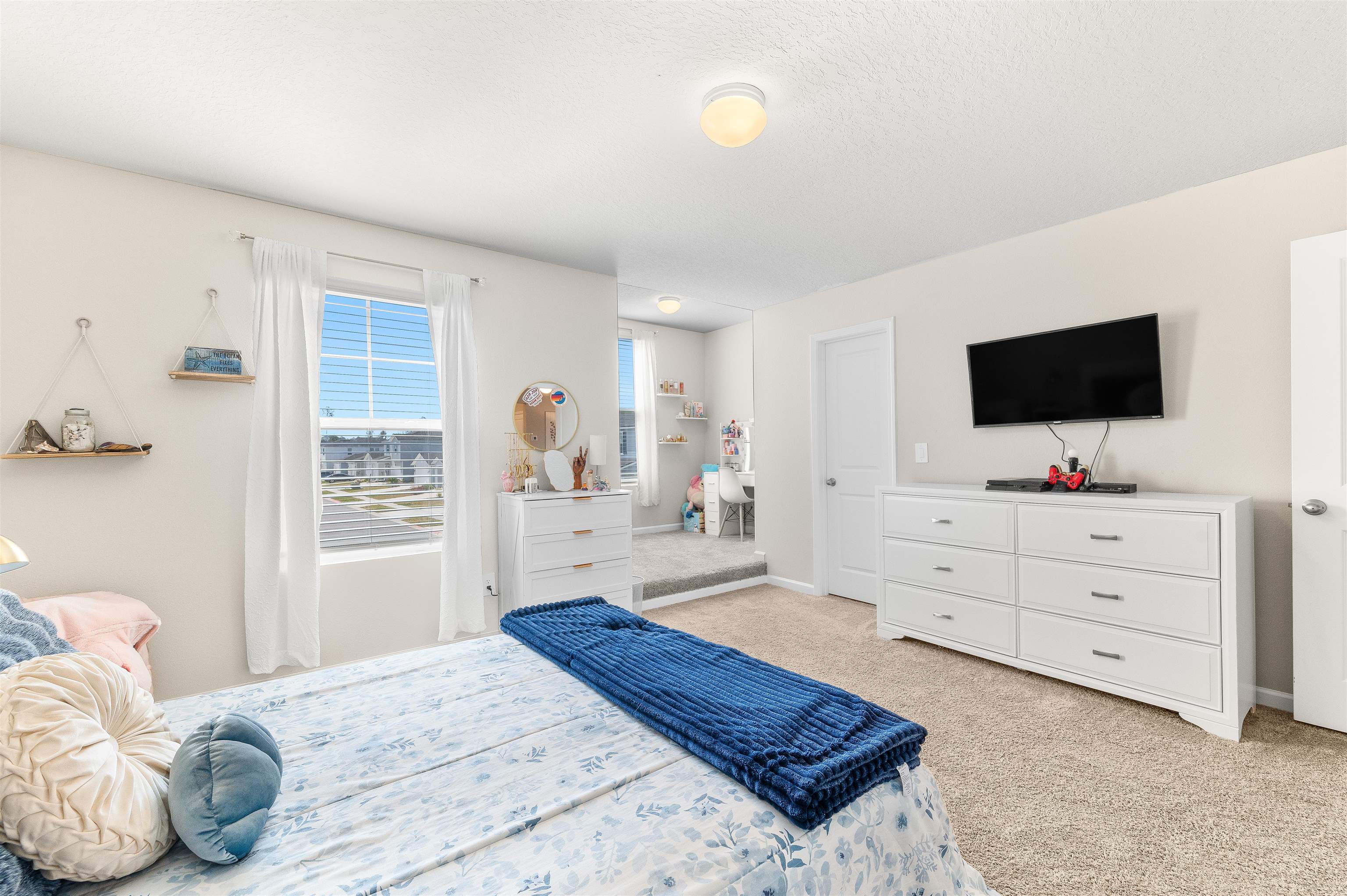 71 Barbosa Trail St. Augustine, FL 32095 - Photo 23 of 51 a bedroom with a bed and a flat screen tv