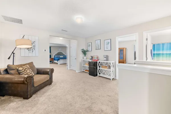 a living room with furniture and a couch