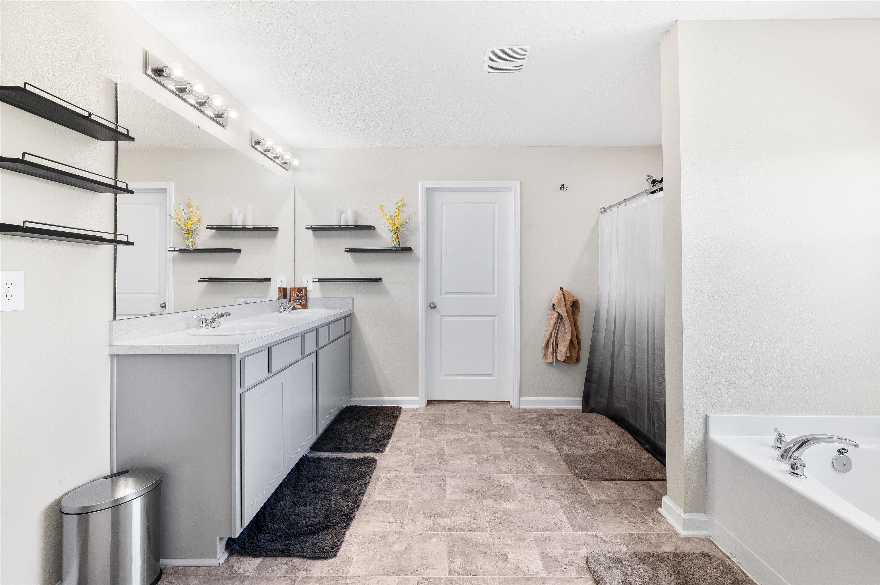 71 Barbosa Trail St. Augustine, FL 32095 - Photo 29 of 51 a kitchen with a sink refrigerator and cabinets
