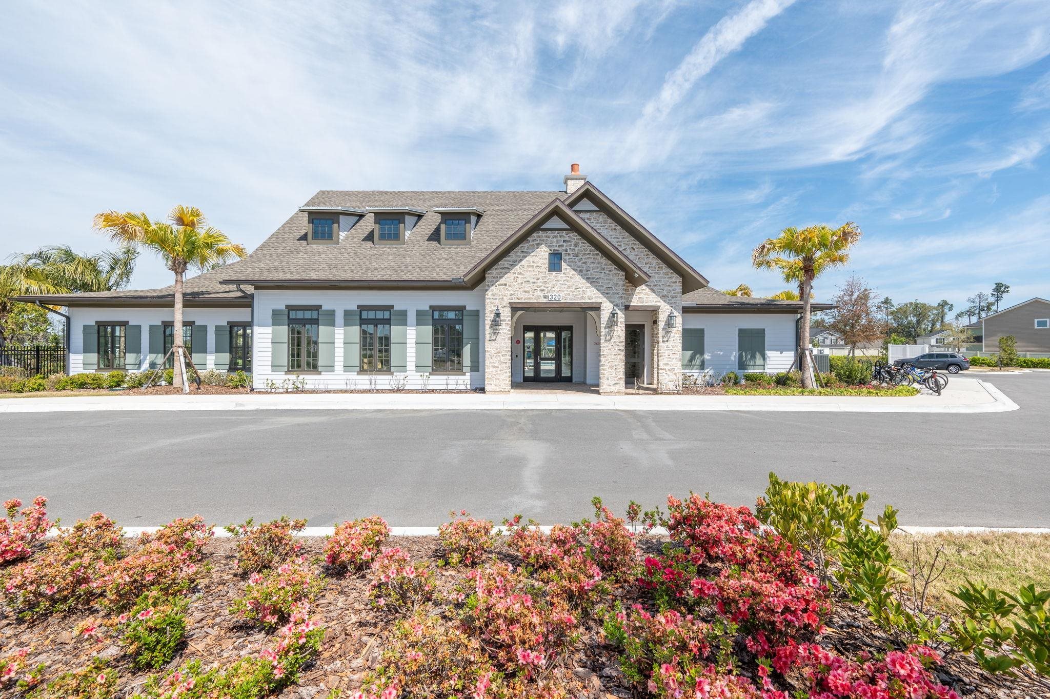 71 Barbosa Trail St. Augustine, FL 32095 - Photo 40 of 51 a front view of a house with a yard