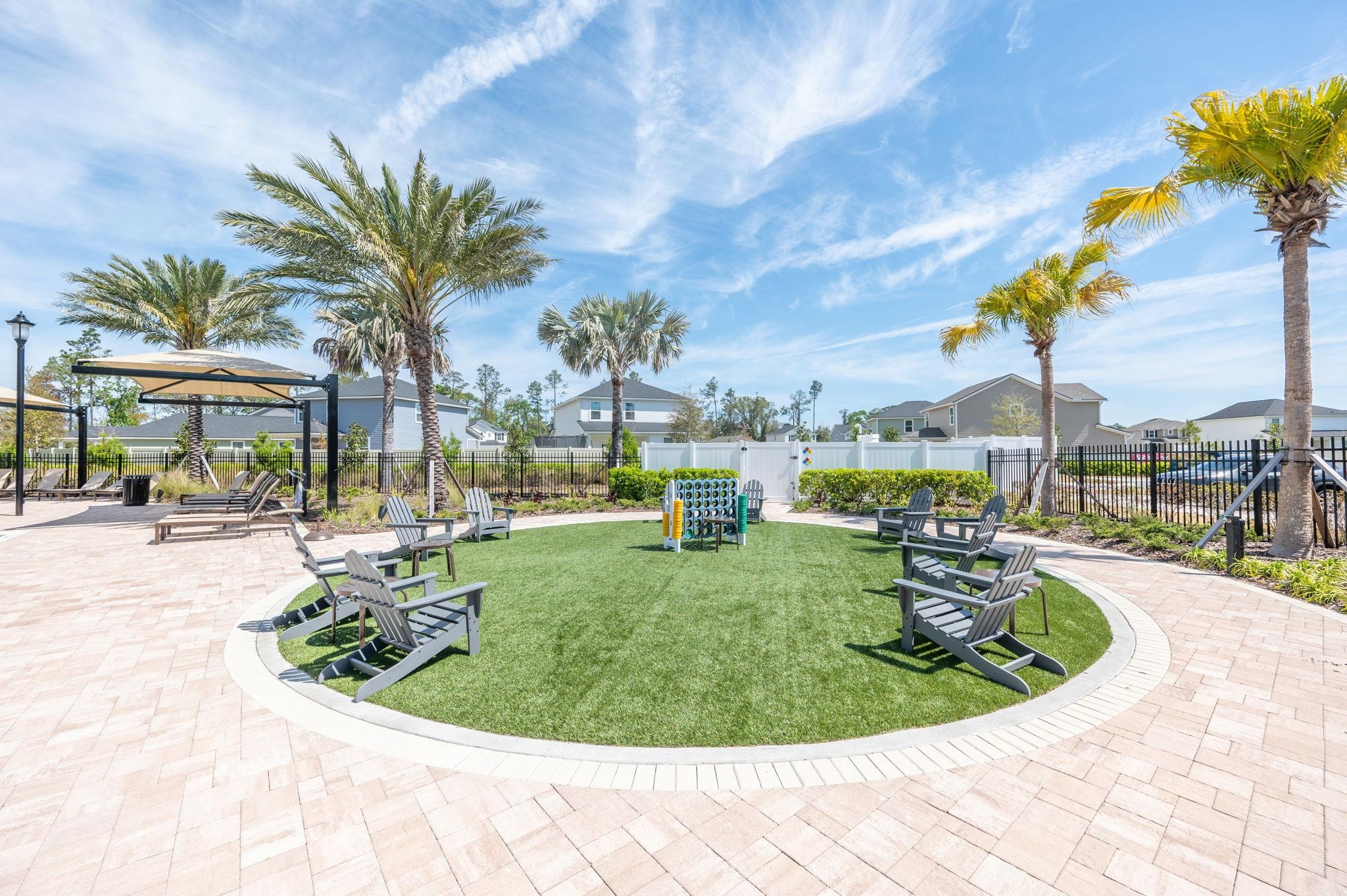 71 Barbosa Trail St. Augustine, FL 32095 - Photo 43 of 51 a view of a swimming pool with a lounge chair