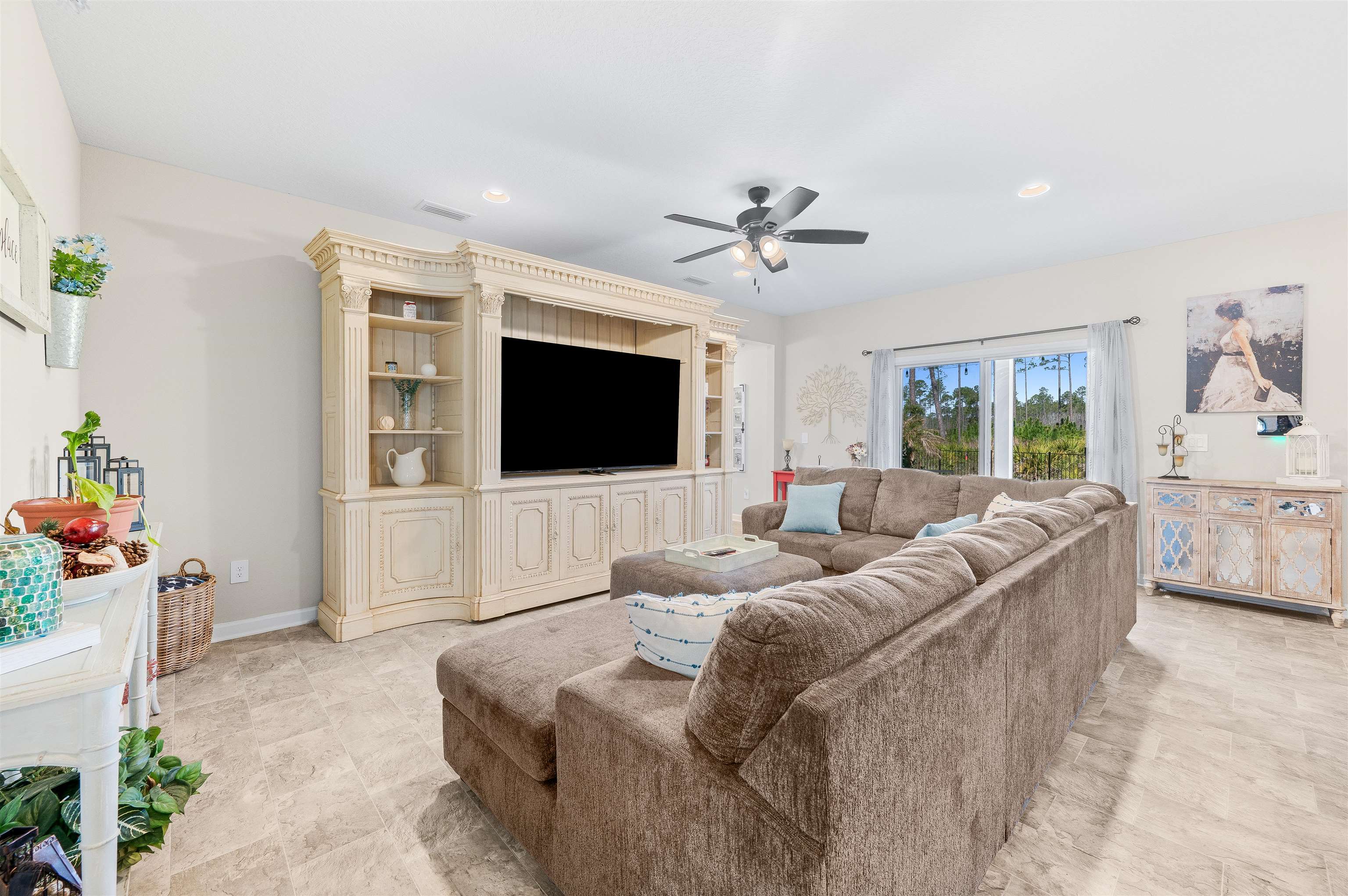71 Barbosa Trail St. Augustine, FL 32095 - Photo 6 of 51 a living room with furniture and a flat screen tv