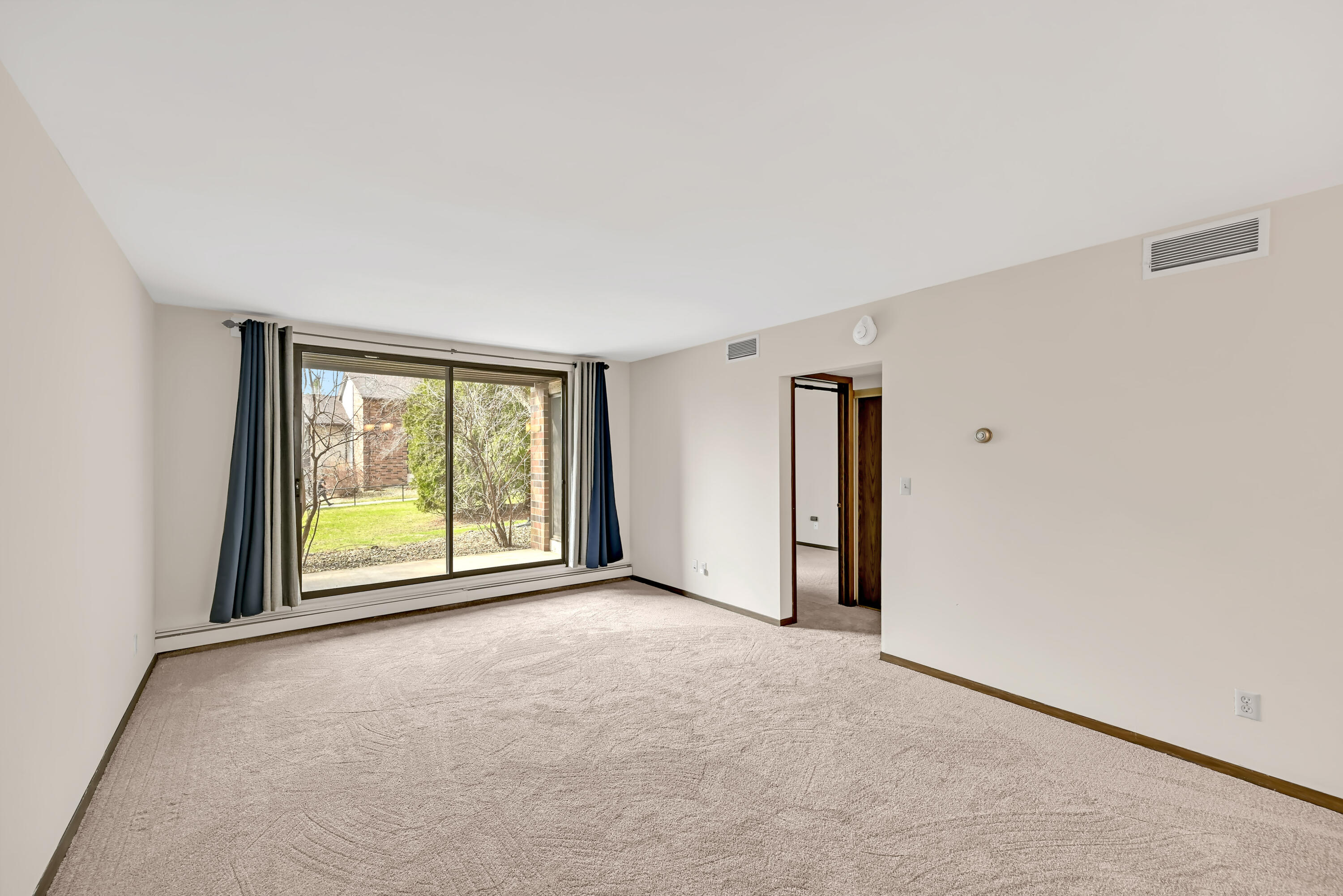 2200 Good Hope Road, Unit 117 Glendale, WI 53209 - Photo 2 of 18 Light Filled Living Room