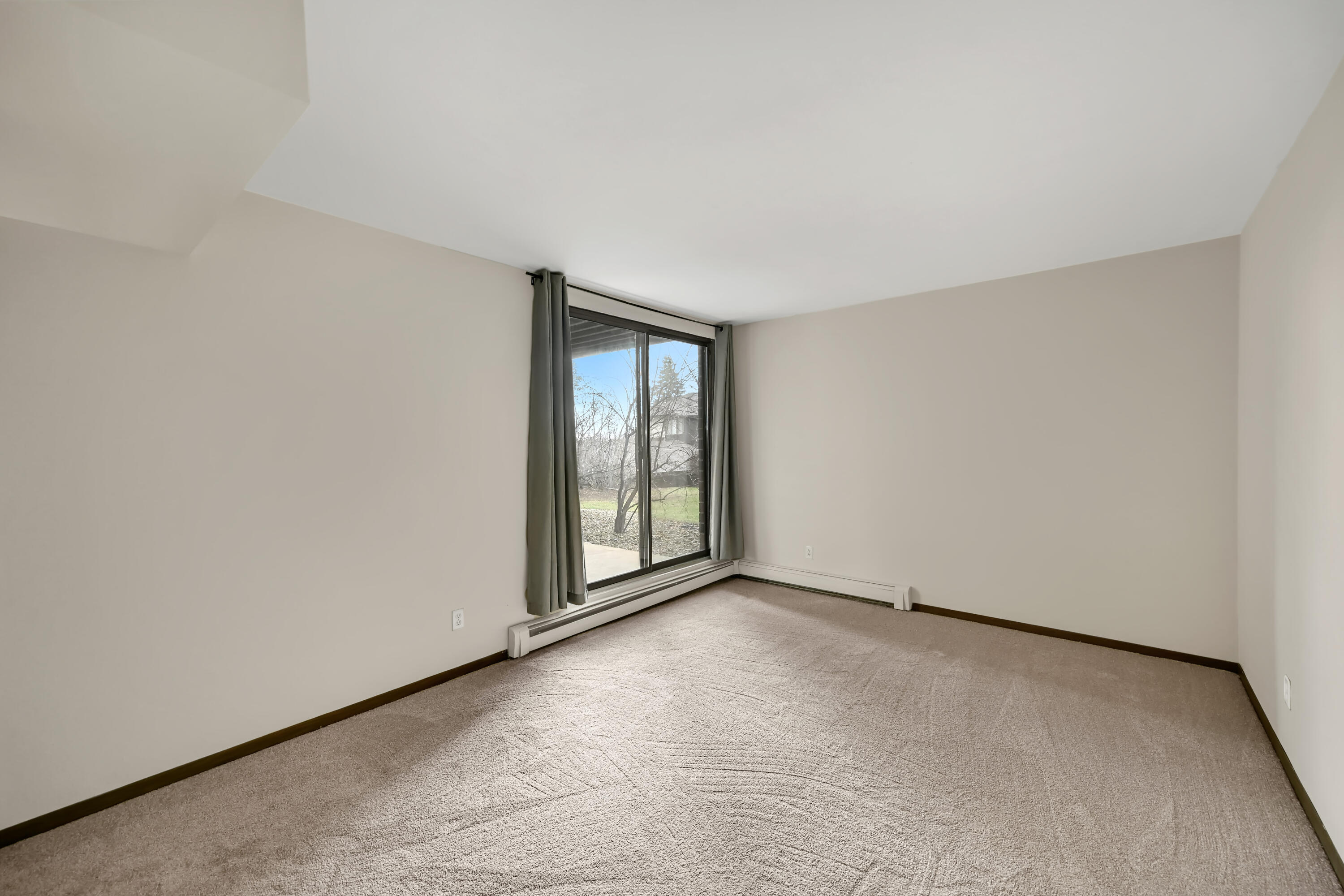 2200 Good Hope Road, Unit 117 Glendale, WI 53209 - Photo 6 of 18 Bedroom w/ Patio Access