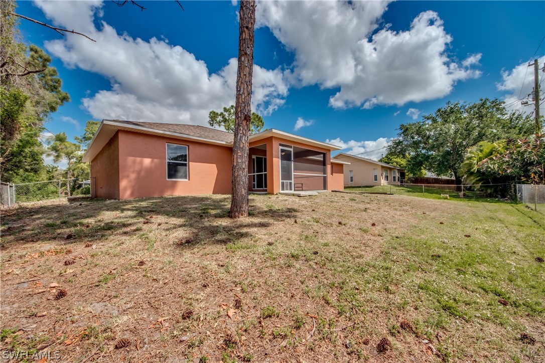 9056 Aster Road Fort Myers, FL 33967 - Photo 6 of 6 a front view of house with yard