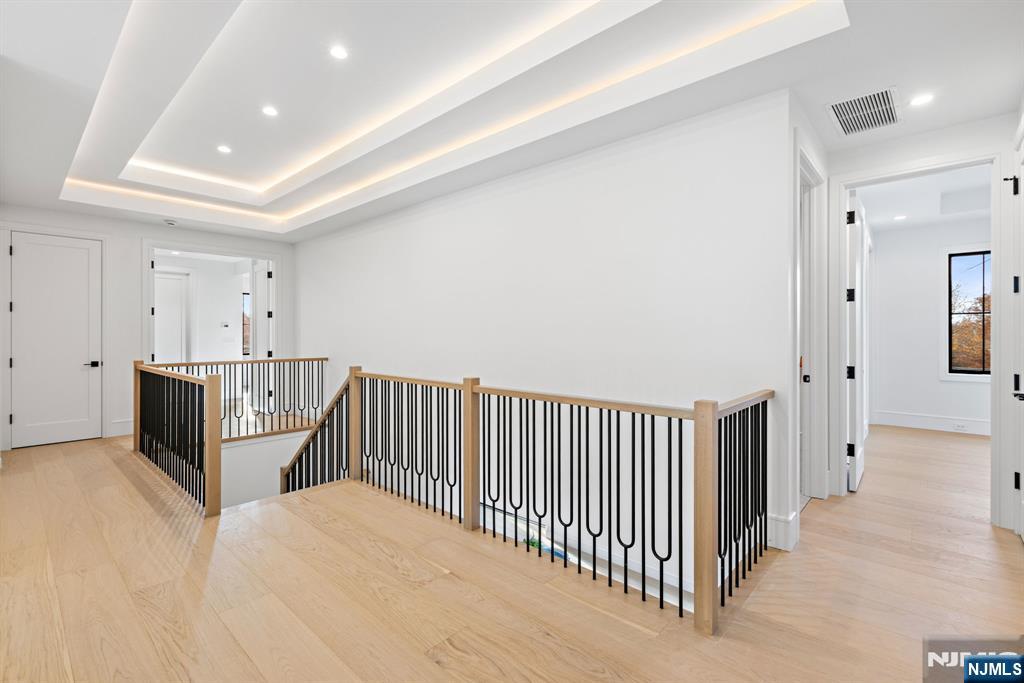 375 Burnet Place Paramus, NJ 07652 - Photo 20 of 37 a view of a hallway with a sink