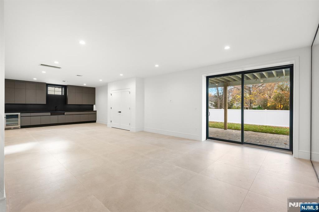375 Burnet Place Paramus, NJ 07652 - Photo 27 of 37 a view of an empty room with a sliding door