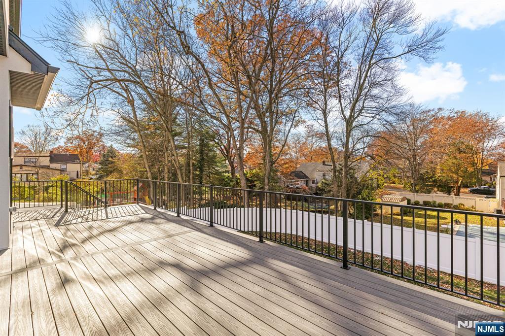 375 Burnet Place Paramus, NJ 07652 - Photo 33 of 37 a view of a wooden bench next to a building