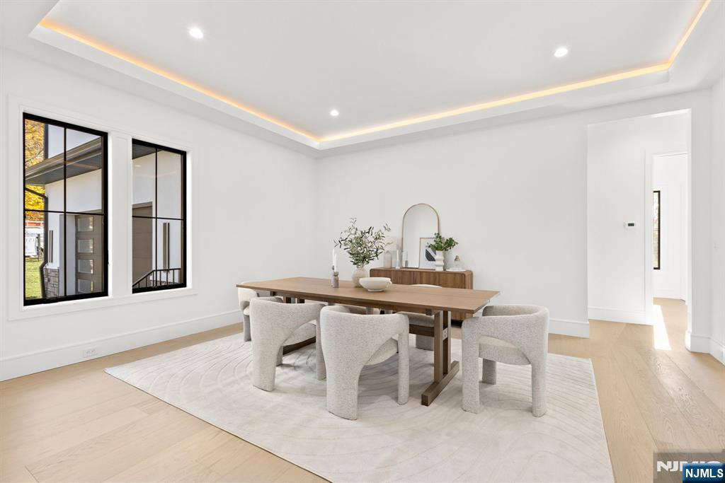 375 Burnet Place Paramus, NJ 07652 - Photo 7 of 37 a view of a dining room with a table and chairs