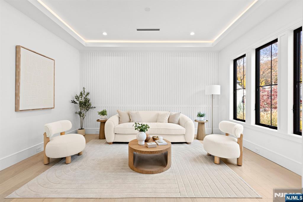 375 Burnet Place Paramus, NJ 07652 - Photo 9 of 37 a living room with furniture and a large window