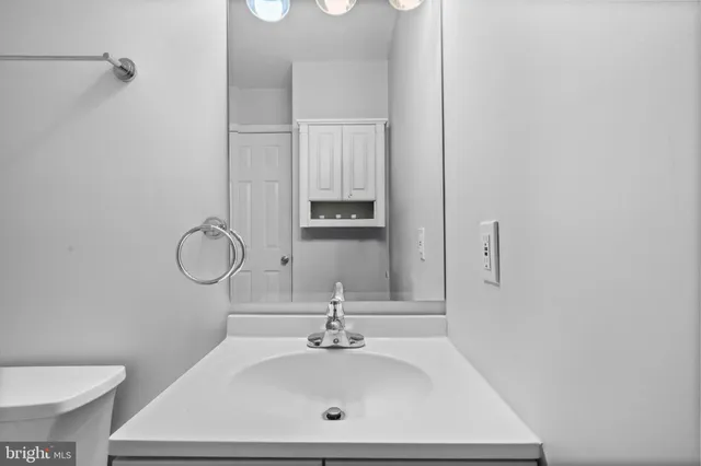 a bathroom with a sink and a toilet