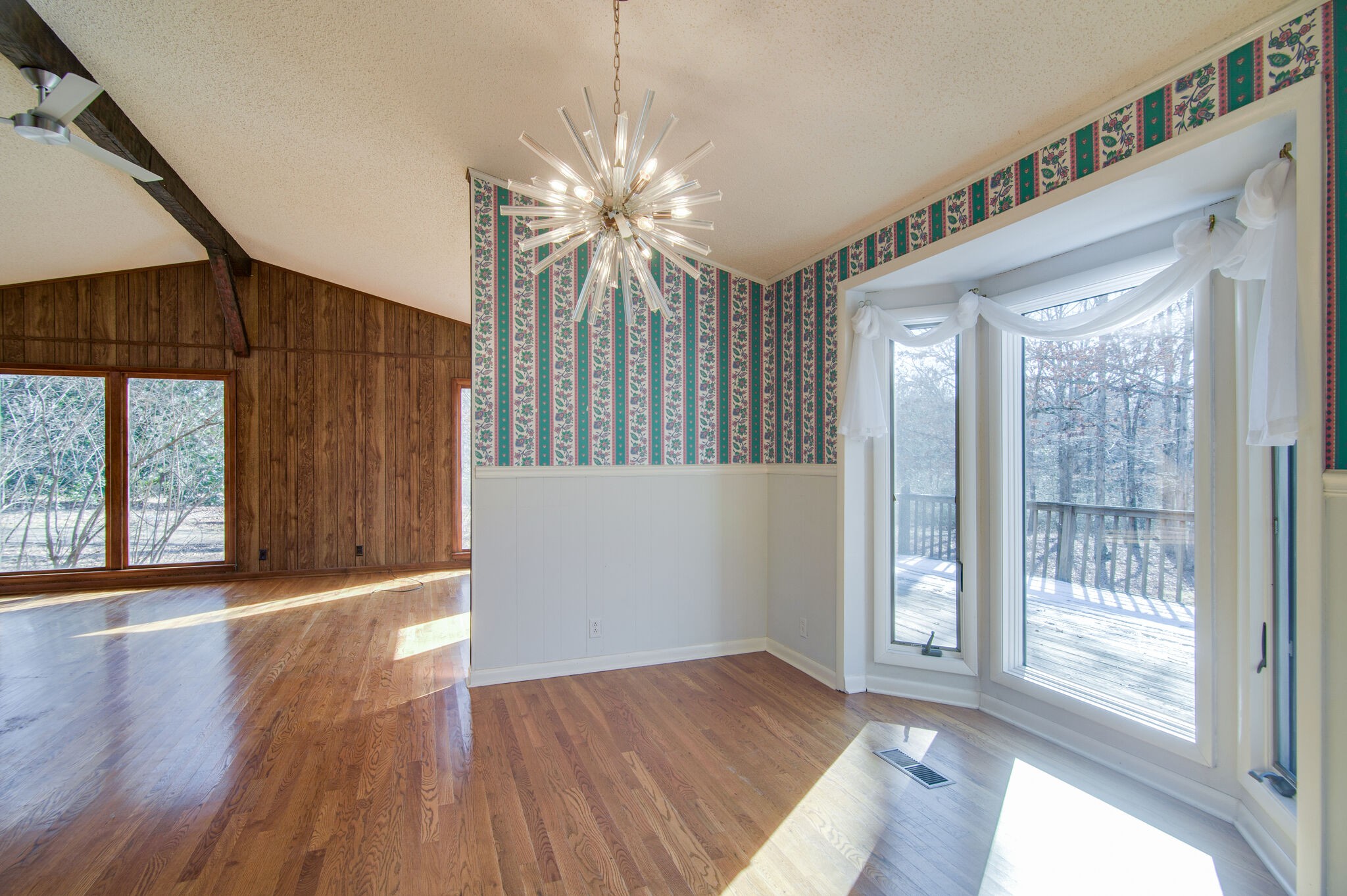 7325 Overby Road Fairview, TN 37062 - Photo 15 of 49 a view of an empty room with wooden floor and a window