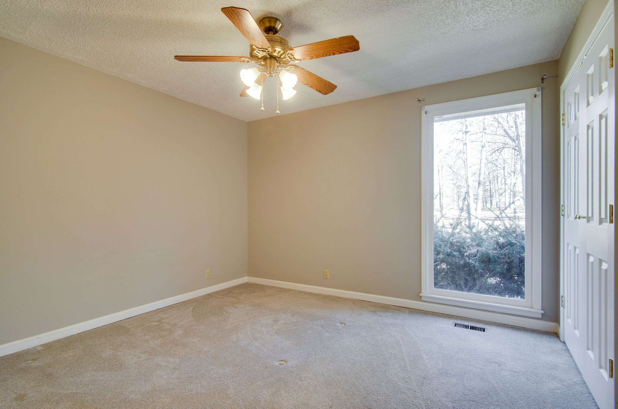 7325 Overby Road Fairview, TN 37062 - Photo 23 of 49 an empty room with a window