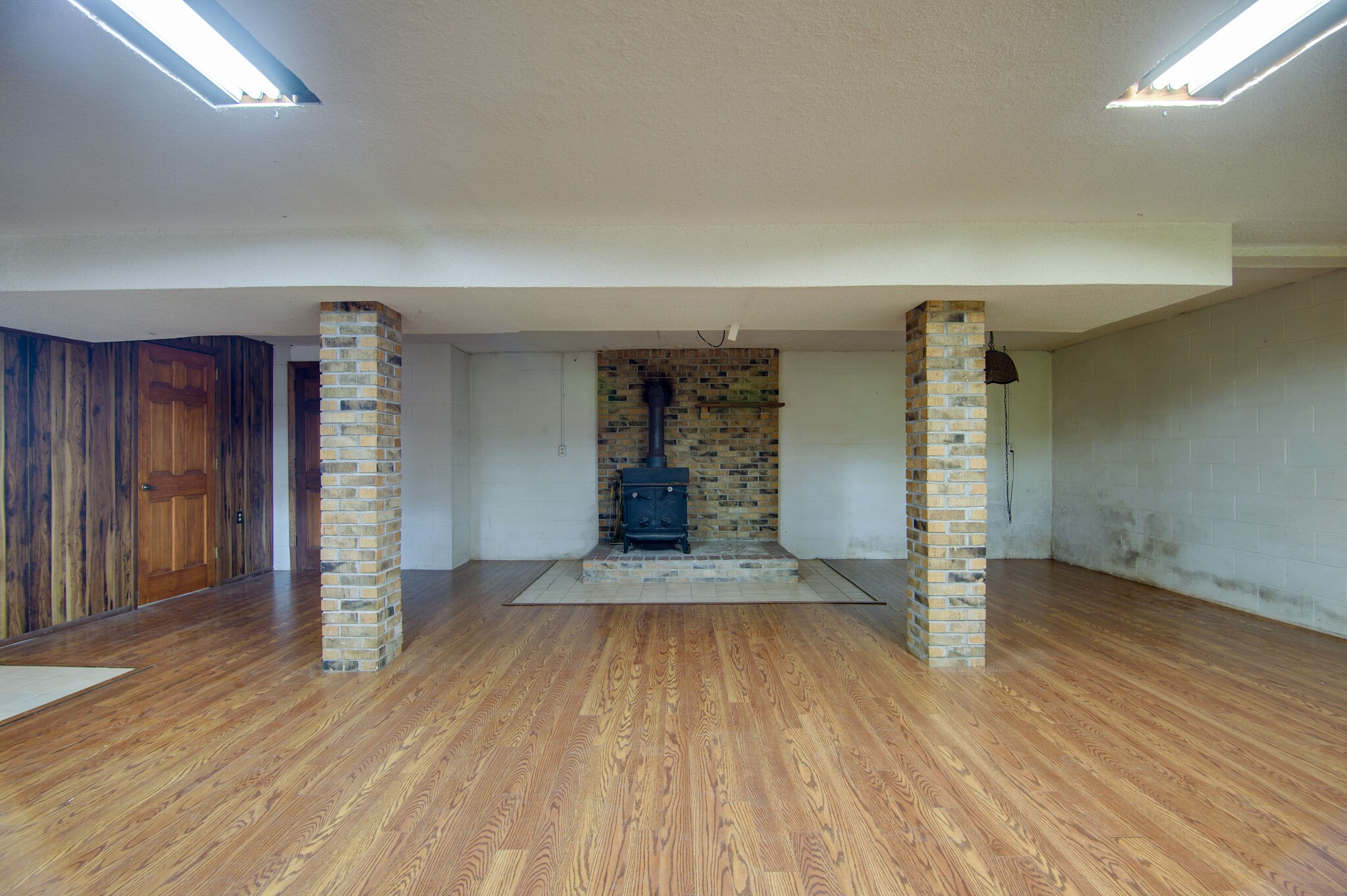 7325 Overby Road Fairview, TN 37062 - Photo 29 of 49 an empty room with wooden floor and entrance
