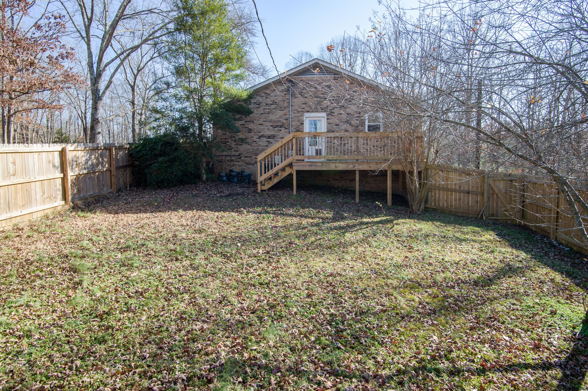 7325 Overby Road Fairview, TN 37062 - Photo 32 of 49 a view of a house with a large tree and a yard