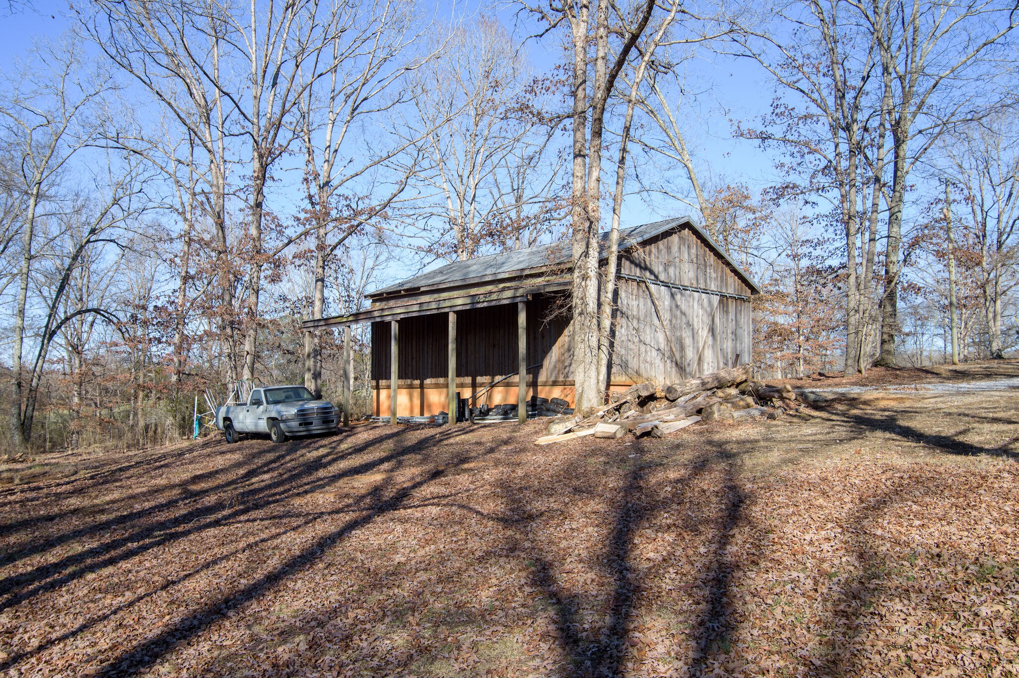 7325 Overby Road Fairview, TN 37062 - Photo 45 of 49 a view of a house with a yard covered in snow