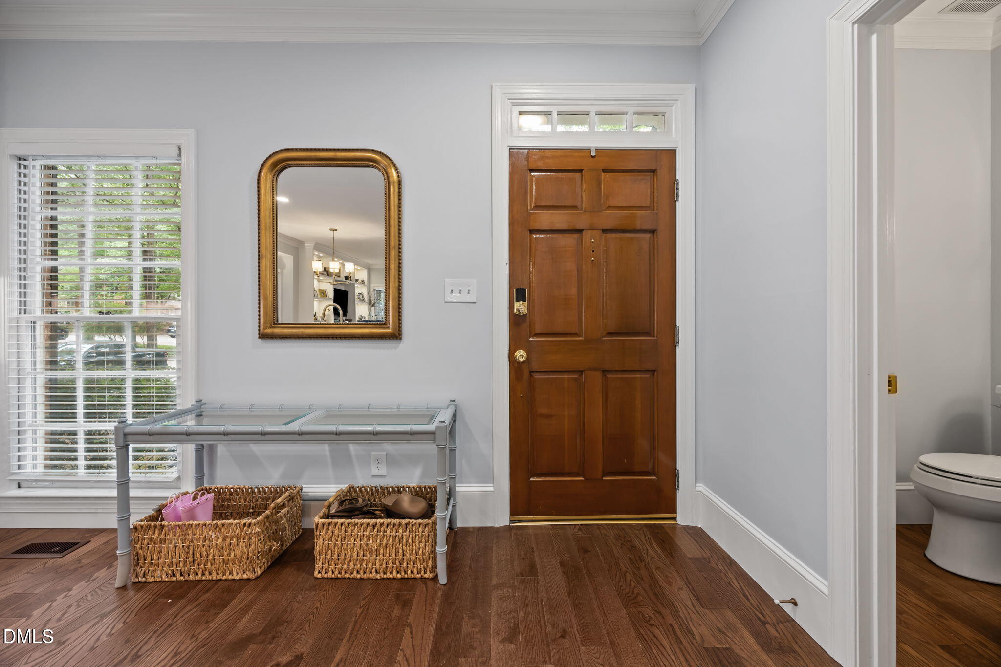 562 Weathergreen Drive Raleigh, NC 27615 - Photo 12 of 47 a hallway with window and furniture